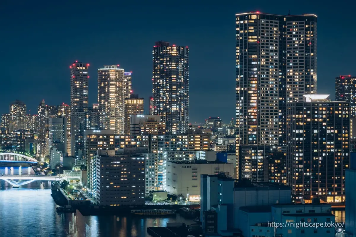 High-rise buildings with bright window lights