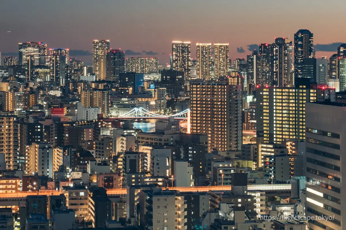 Illuminated Kiyosu Bridge and Tsukishima high-rise buildings