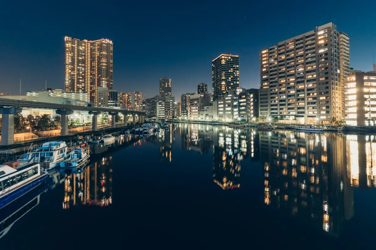 Beautiful reflections of building lights on the water surface