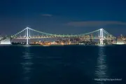 Rainbow Bridge illuminated at night